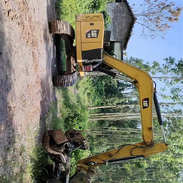 9.44 tonnes presque neuve importée du Japon machine à excavatrice à rampe recyclée CAT 310