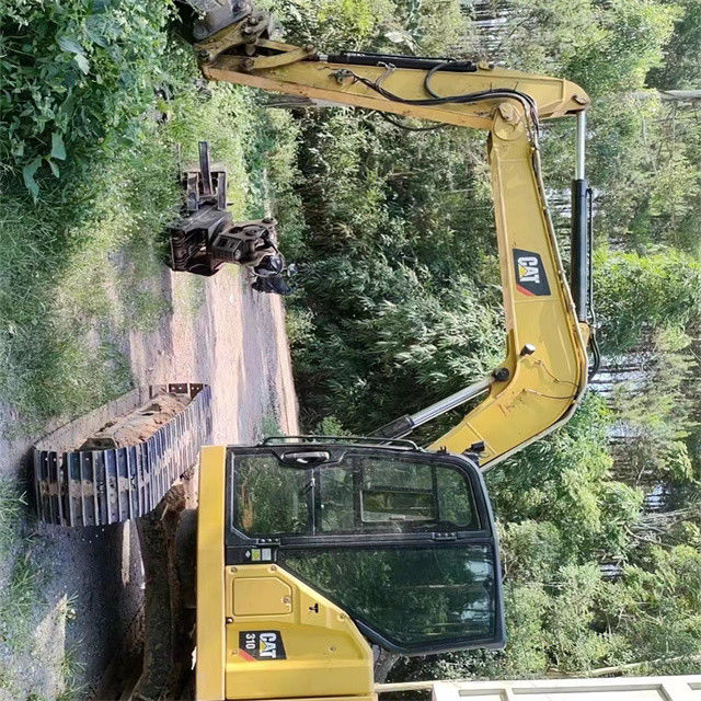 9.44 tonnes presque neuve importée du Japon machine à excavatrice à rampe recyclée CAT 310