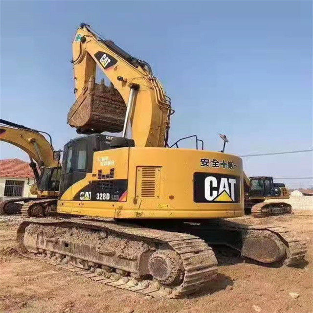 34.7 tonnes prêtes à l'emploi et expérimentées utilisées Japon Caterpillar 328 D en bon état