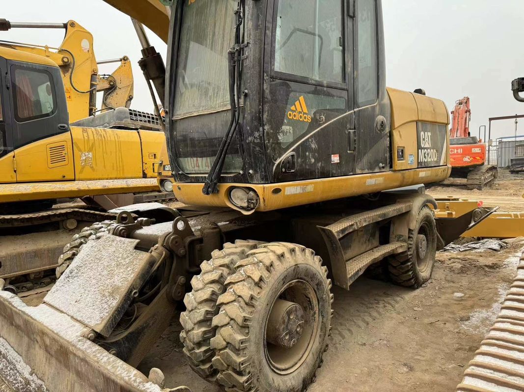 90% Caterpillar M317D2 Excavateur à roues d'occasion de haute qualité et de meilleures performances à vendre