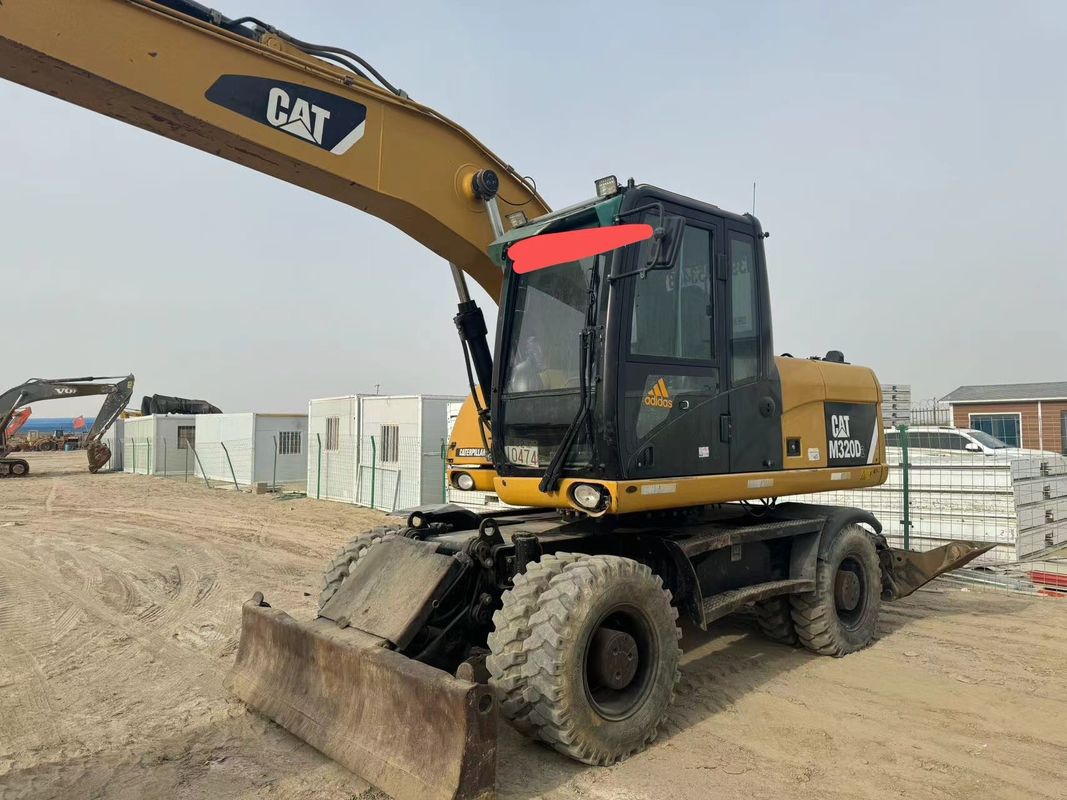 90% Caterpillar M317D2 Excavateur à roues d'occasion de haute qualité et de meilleures performances à vendre