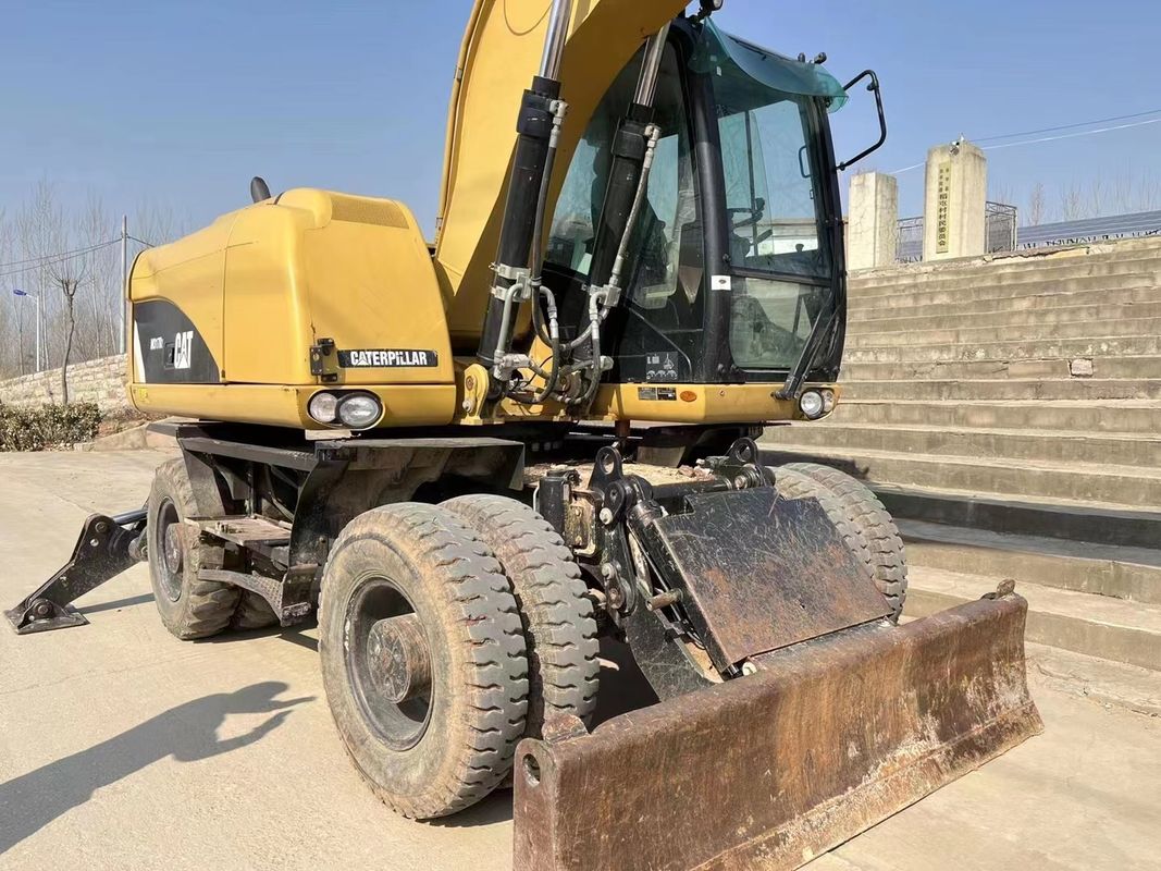 90% Caterpillar M317D2 Excavateur à roues d'occasion de haute qualité et de meilleures performances à vendre