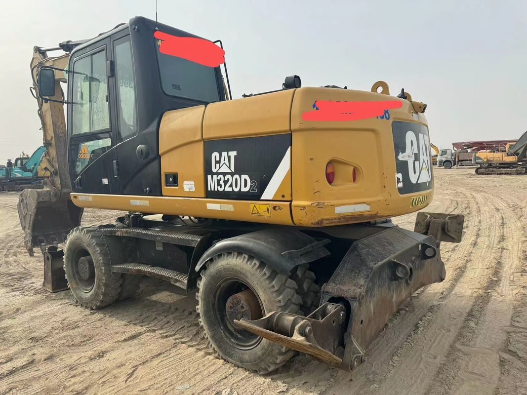 90% Caterpillar M317D2 Excavateur à roues d'occasion de haute qualité et de meilleures performances à vendre