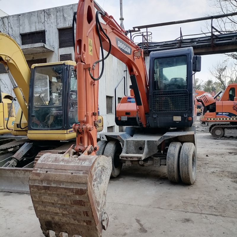 La Corée a importé 90% de la nouvelle excavatrice à roues d'occasion Doosan DX 60W de haute qualité et de meilleures performances à vendre