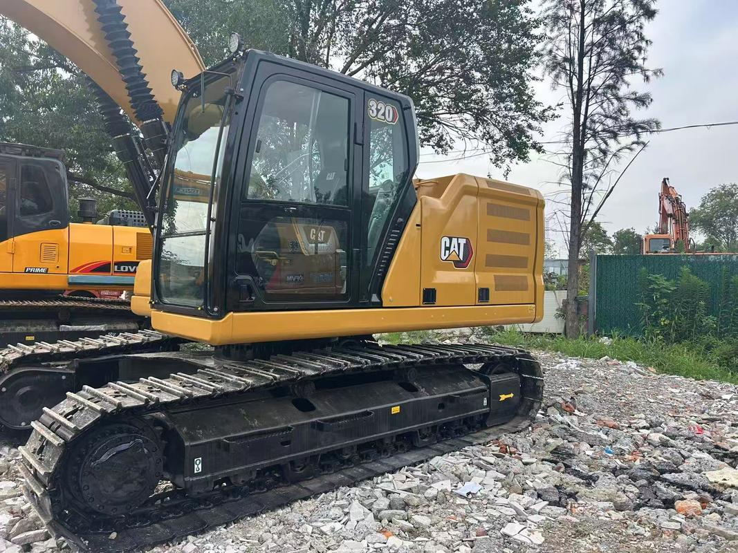 Excavatrice sur chenilles CAT 320 d'occasion - Hauteur de transport 2,96 m - 22,5 T