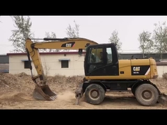 90% Caterpillar M317D2 Excavateur à roues d'occasion de haute qualité et de meilleures performances à vendre